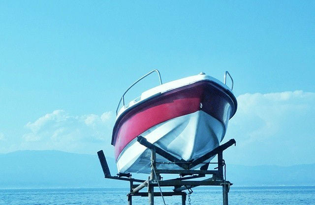 How does hull shape affect boat performance?